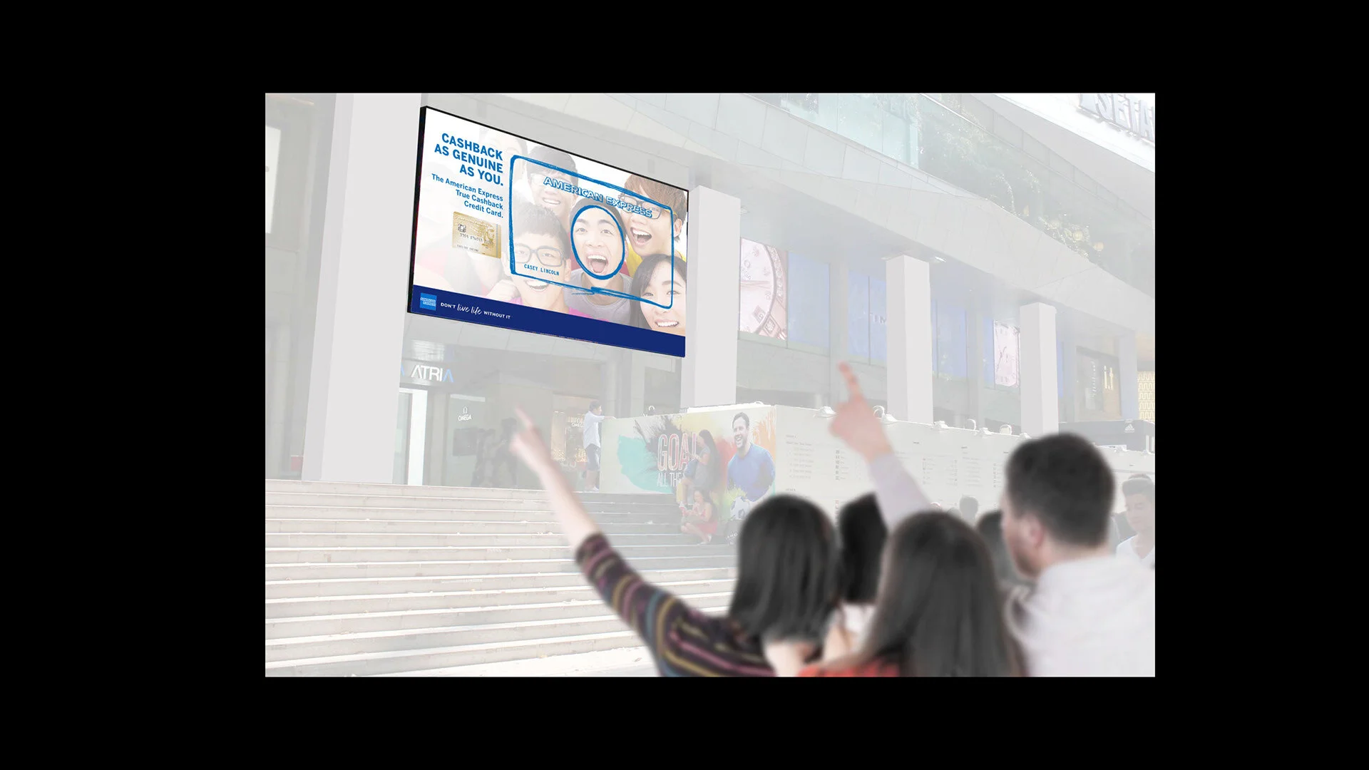 An interactive billboard that projects real human faces into our ad. Communicating that our cashback rewards are as genuine as humans.