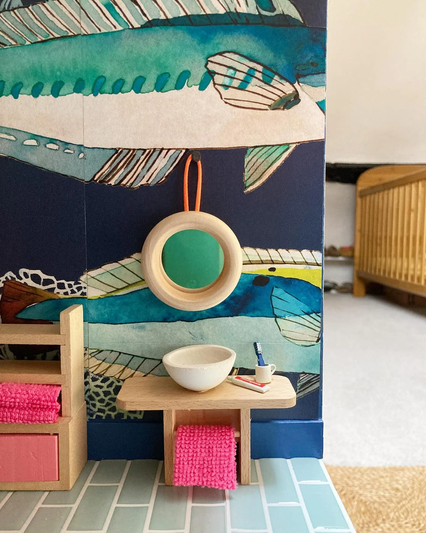Dolls house bathroom 🛁 

It&rsquo;s been a long process doing the bathroom! I used the most fabulous @manuelcanovasparis fish wallpaper. I love the combination of the oversized fish with the mini fittings. The shower is made from laser cut Perspex w