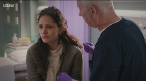 still from CASUALTY, Skye Hallam and Derek Thompson who plays Charlie
