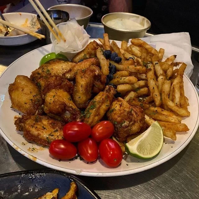 : got #kfc? These are a few of my favorite things... well, I dunno about the tomatoes and blueberries with the fried chicken and fries. Perhaps an attempt to make the dish healthier? #travelandeat #nyc