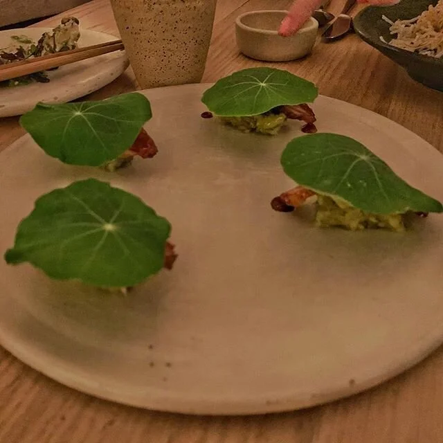 : got #duck? Yeah, I was confused. This nigiri melted in my mouth like it was fatty fish and caught me off guard when we looked back at the menu and read that this was aged duck breast w/ cilantro, banana, and nasturtium. #travelandeat #nyc