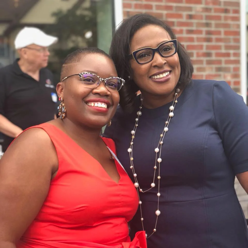 Laquanda Fields (left) with Mayor Lovely Warren at the Warfield Square Ribbon Cutting Celebration.