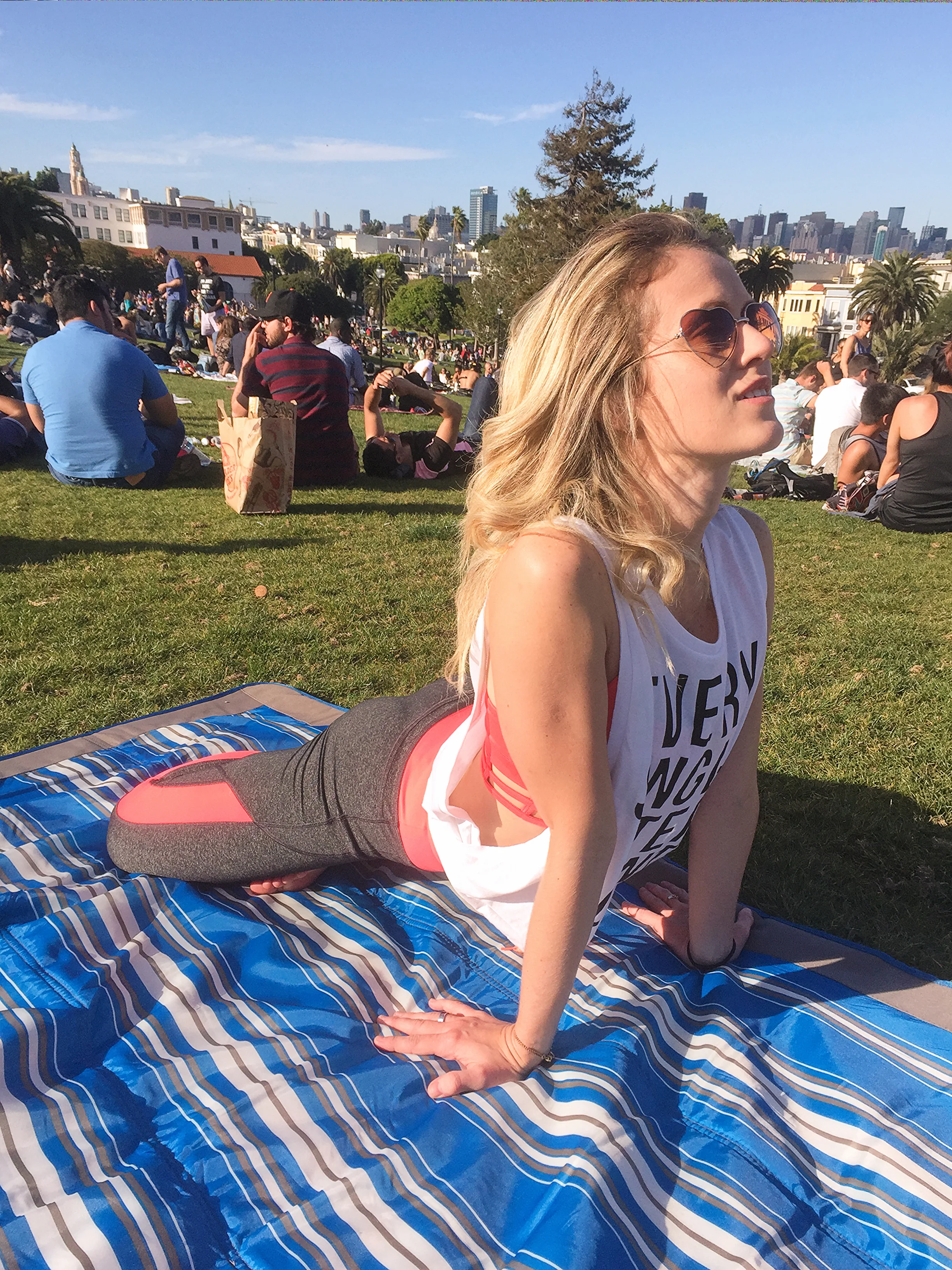 Yoga pose: Lotus Cobra (Padma Bhujangasana) with inverted hands. Good for your back bend, hips opener and wrists. 