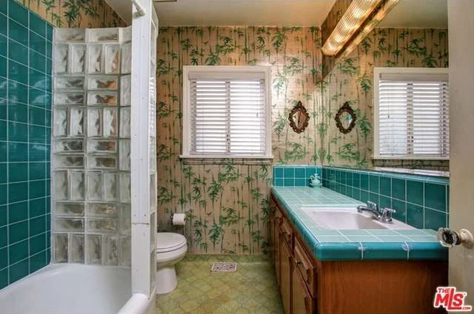 Bathroom Before. That wallpaper! Photo from MLS