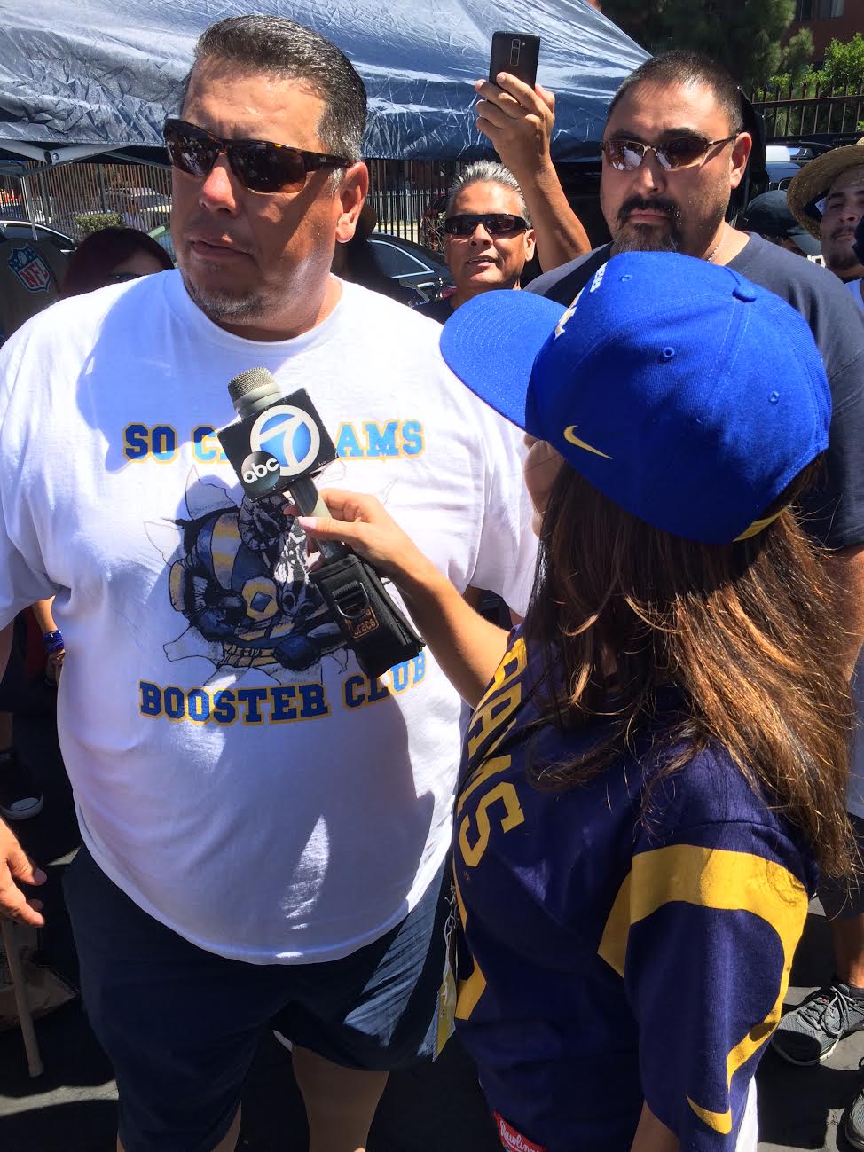 ABC's Ch.7 TV Personality Alysha Del Valle interviewing So Cal Rams Booster Club President Ralph Valdez at the Rams vs. Cowboys Tailgate (2016)