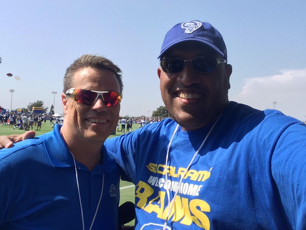 Staff Member Paul Maleno with ABC Ch.7 Sports Reporter Curt Sandoval at the Rams training camp in Irvine. (2016)