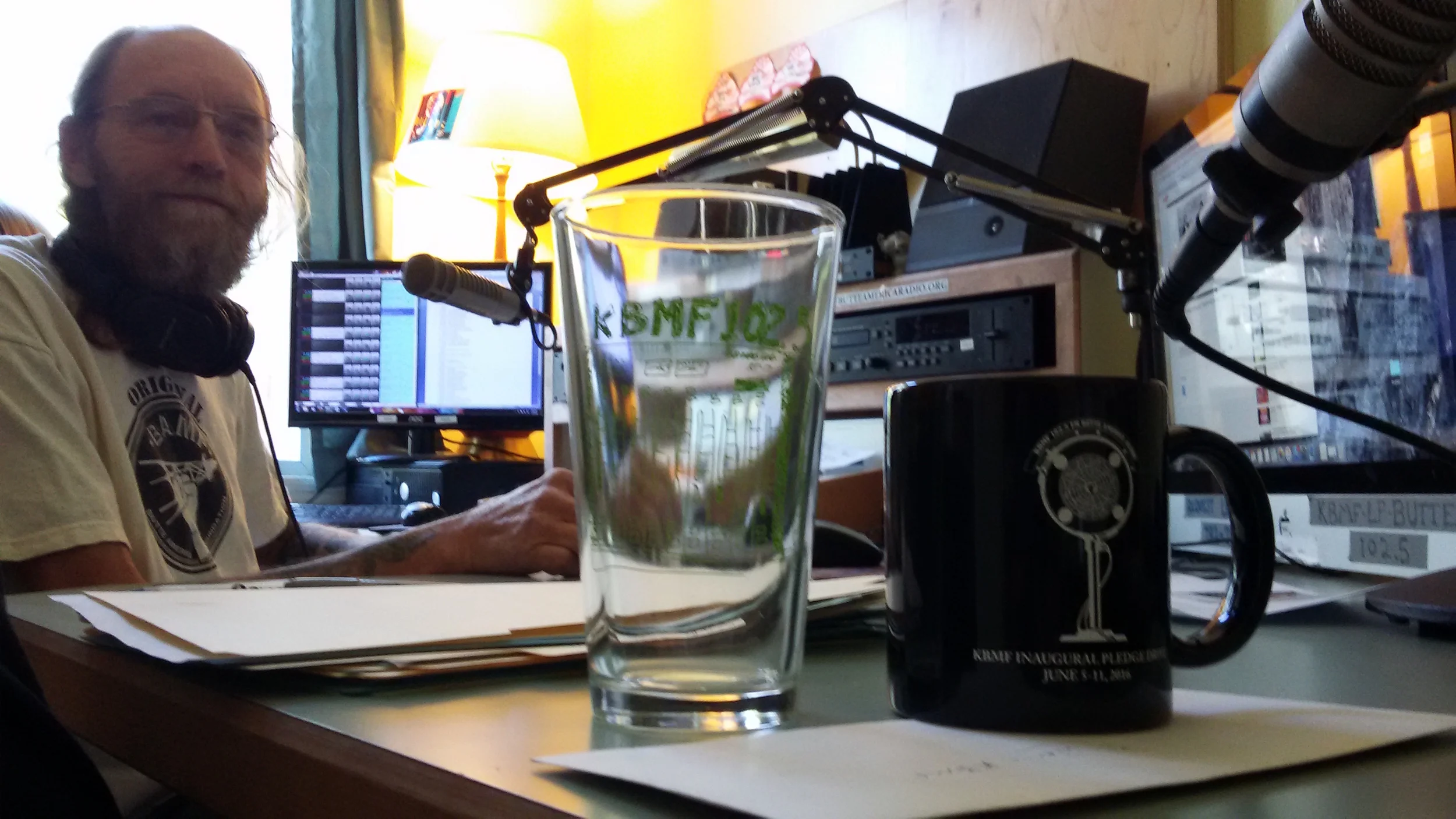 Rockin' Rodney kicks off the pledge drive with early morning music. Check out that KBMF merch!