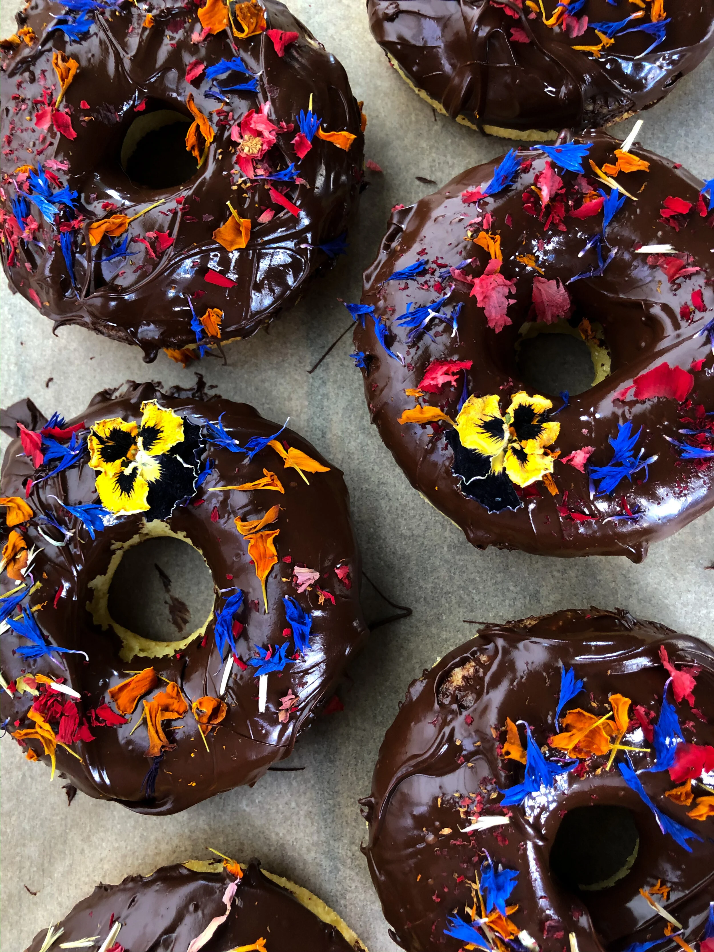 Baked Olive Oil Donuts with Chocolate Frosting and Flowers