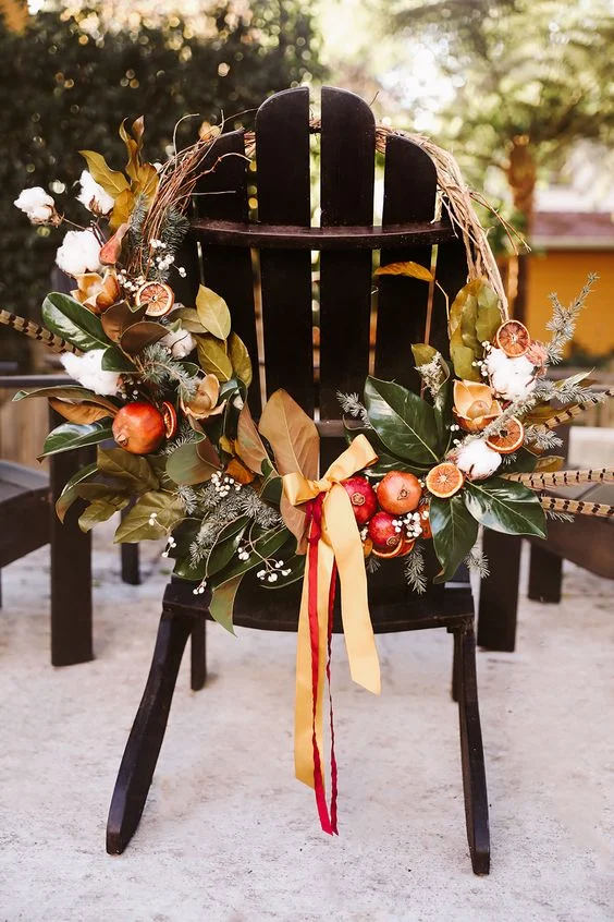 An incredibly gorgeous fall wreath inspired by organic produce and striped feathers VIA