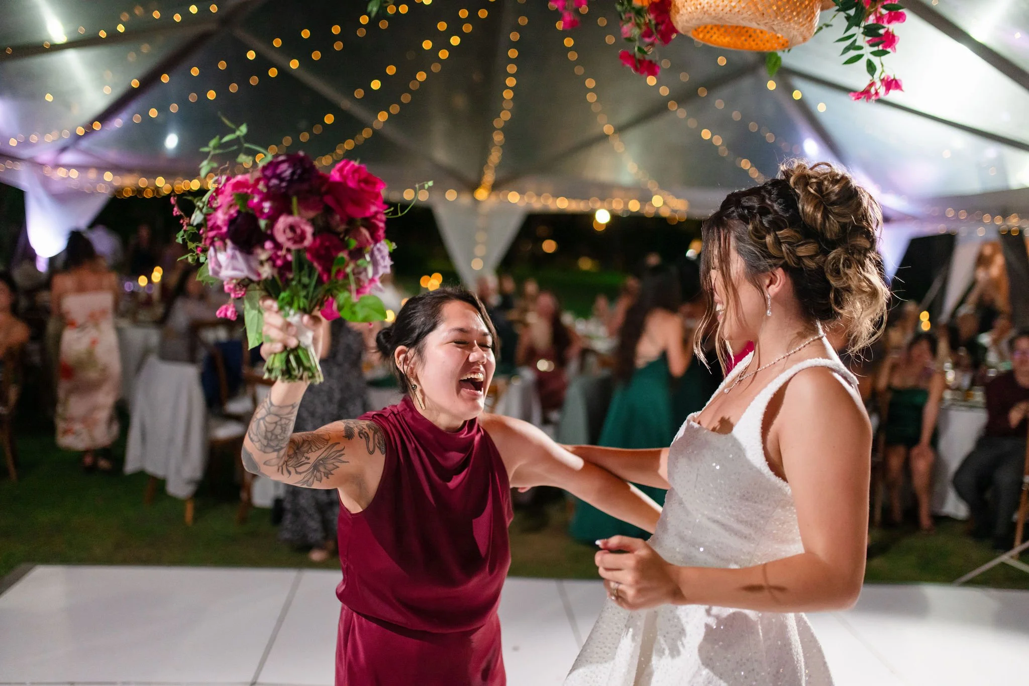 bridesmaid catching bridal bouquet