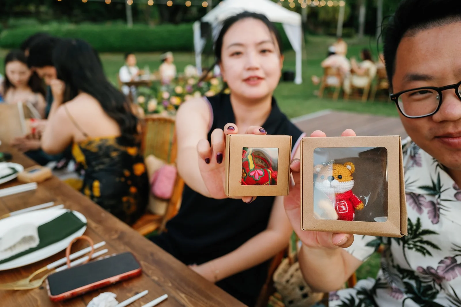 Guests show off their prizes