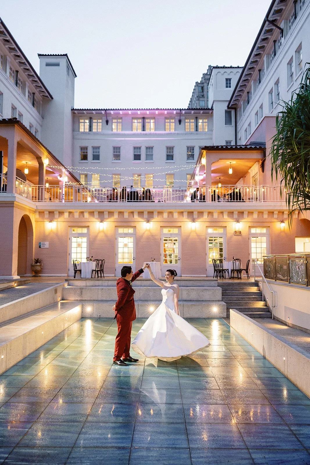 Groom and bride dancing together.