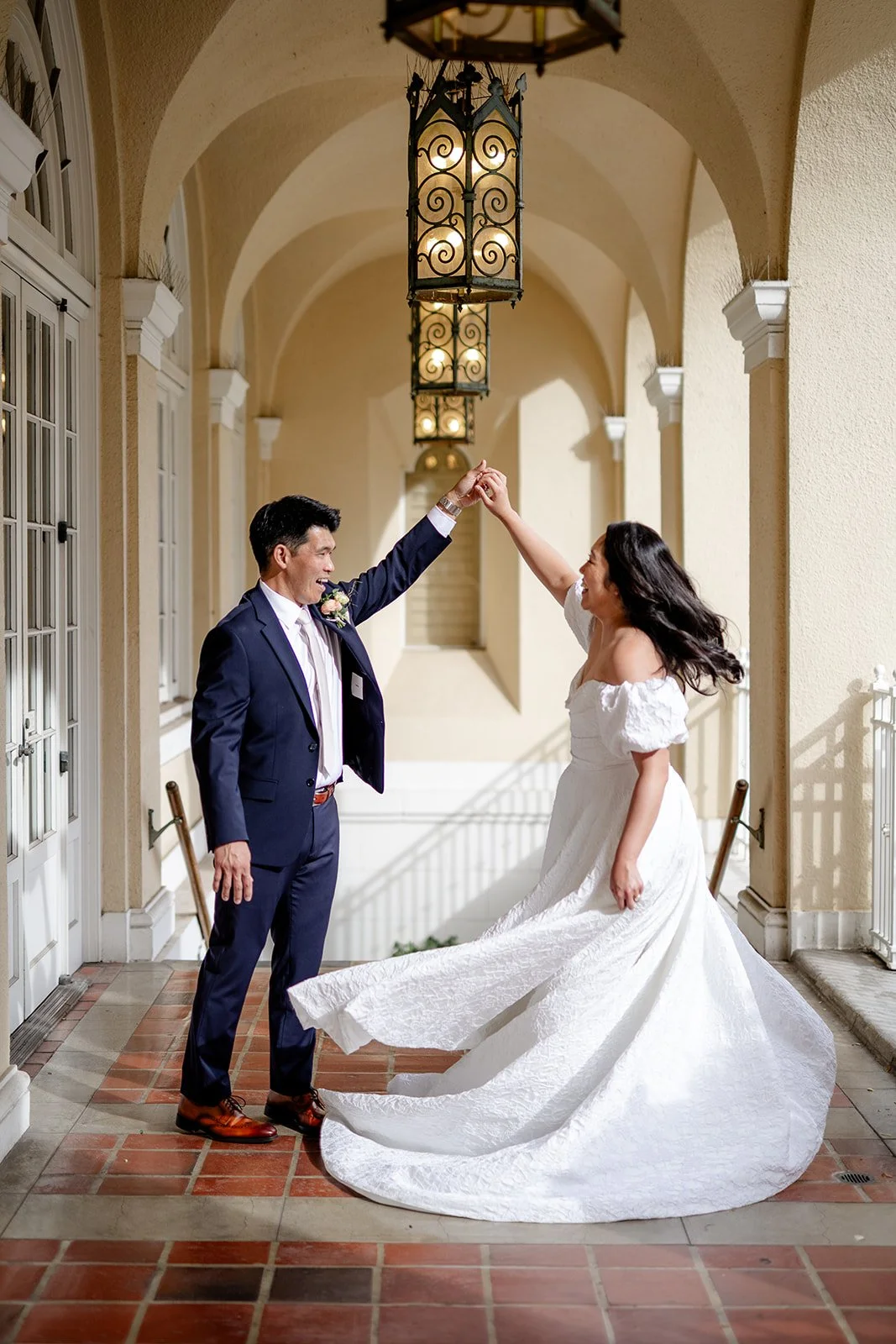 groom spinning bride
