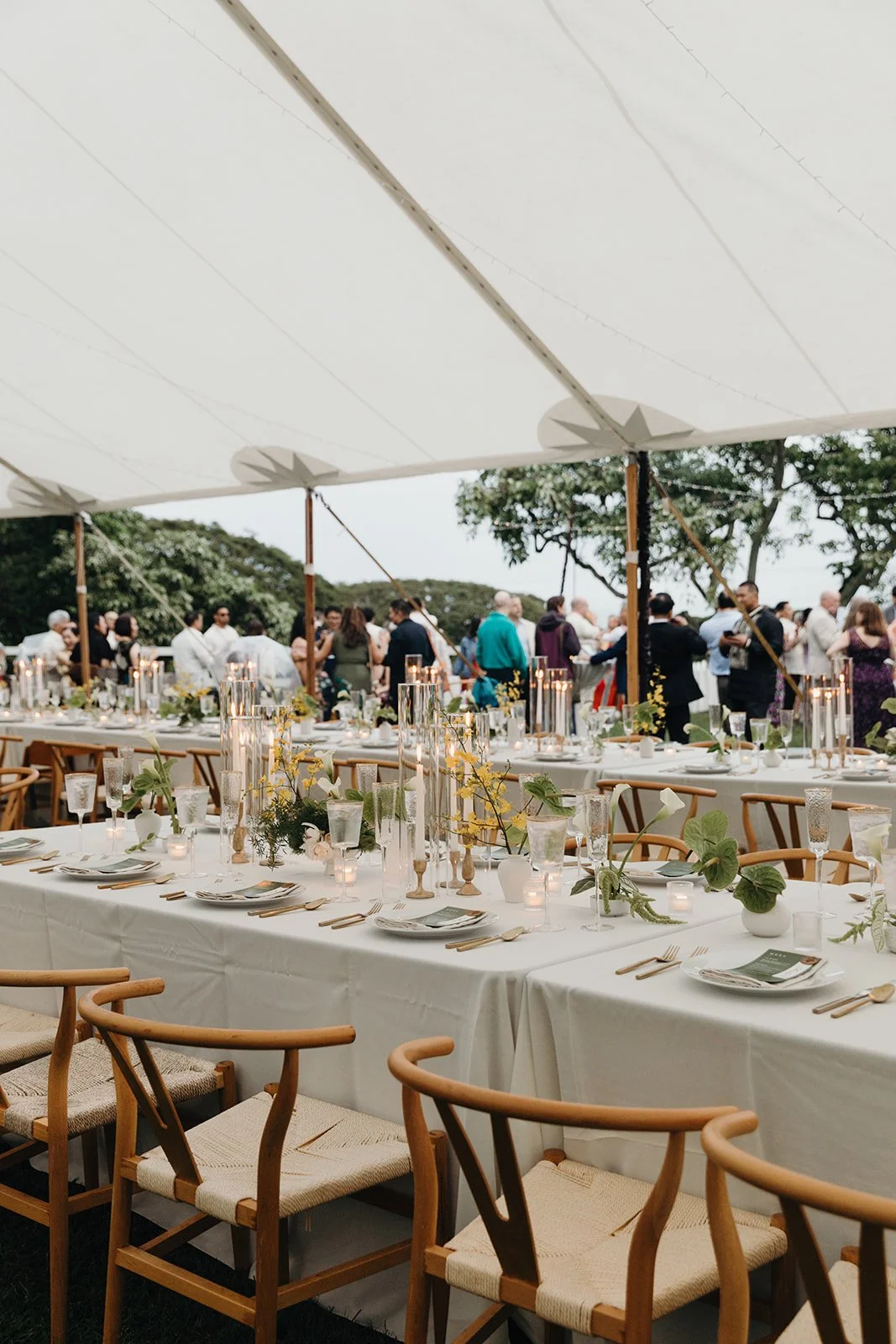white wedding table with yellow and green flowers