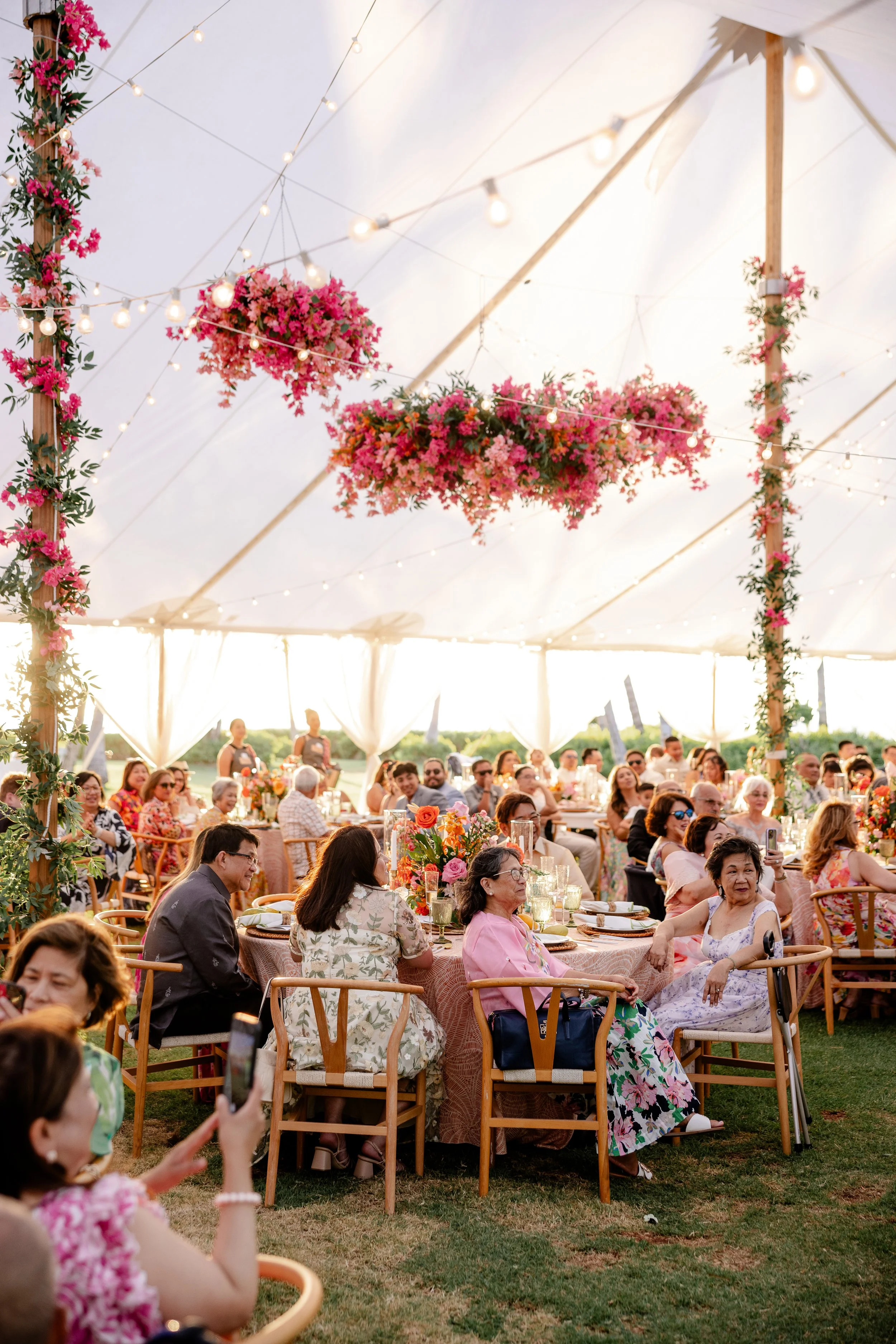 wedding reception in hawaii with hanging pink flower element