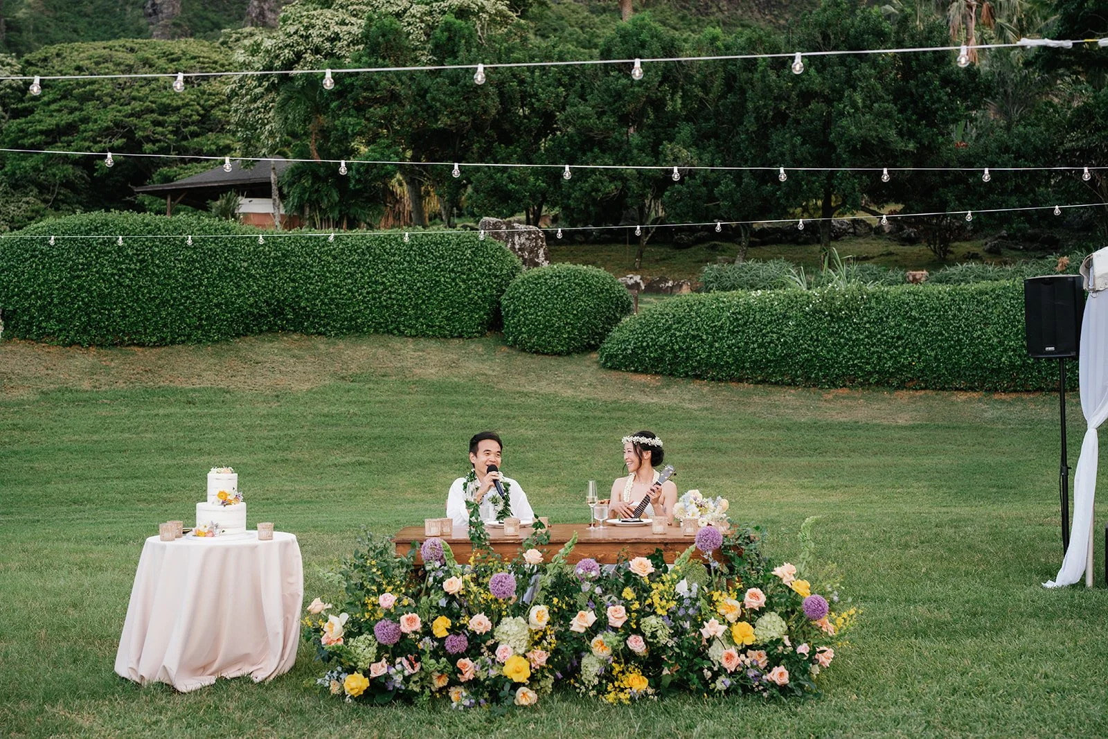 Bride and groom start off the evening by playing a song for the guests