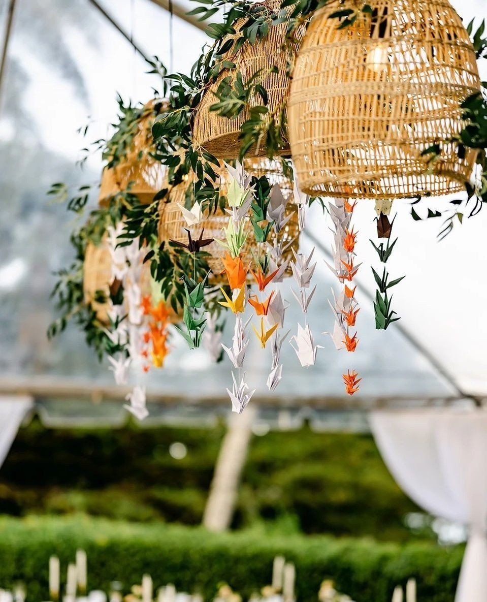 With lanterns being such a large focal point area above the dance floor, we love finding ways to elevate their visual appeal. We especially love how this couple opted to include these crane folding to create a fun and personalized hanging piece! ⁠
⁠
