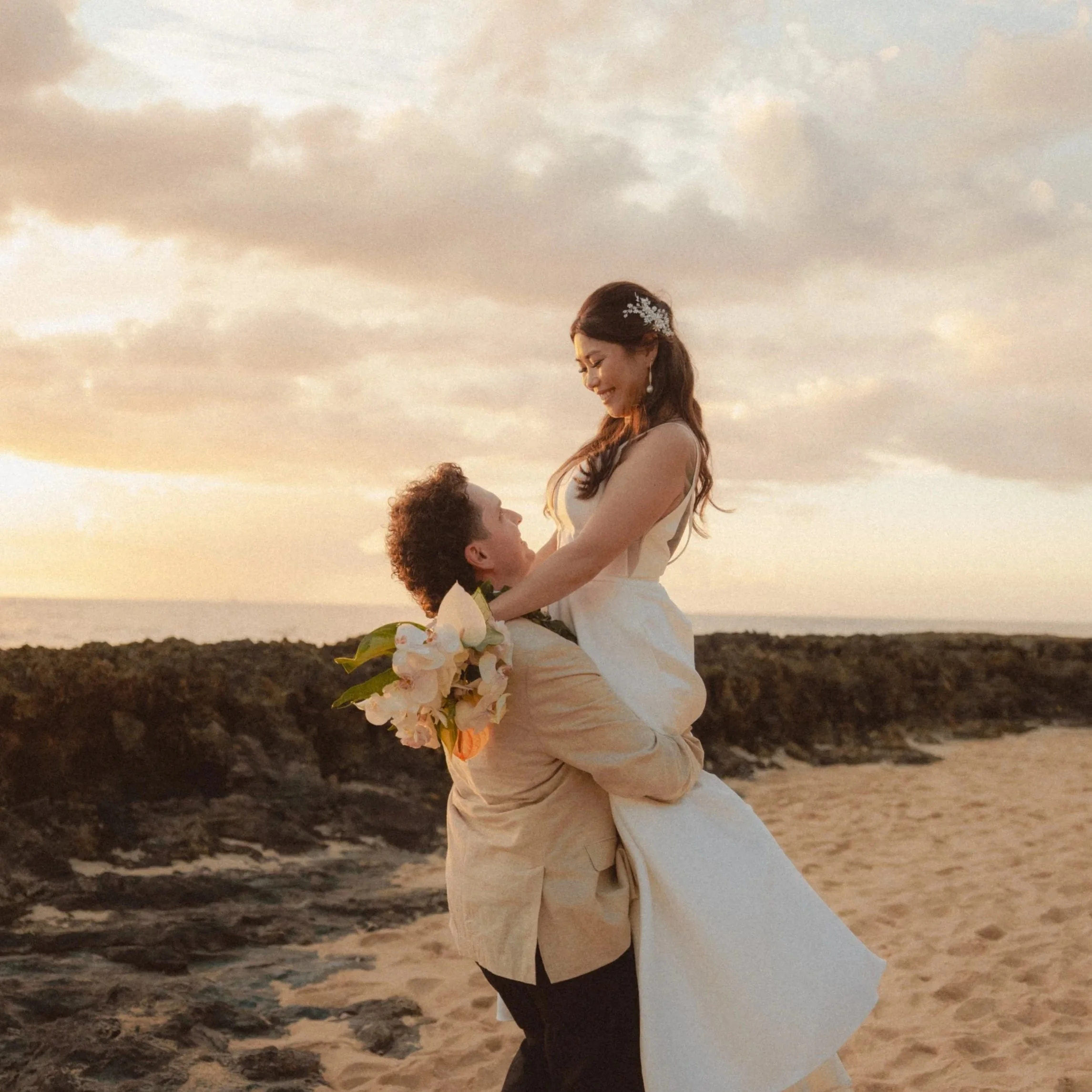 Gina and Tim’s Joyful, Travel-Inspired Wedding at Lanikuhonua