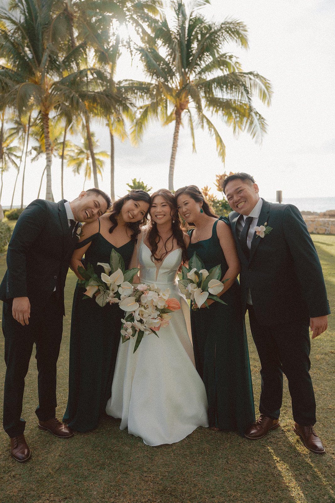 bride with bridal party at wedding in hawaii
