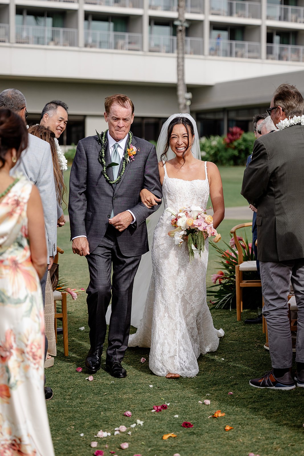 groom and dad walking down the aisle