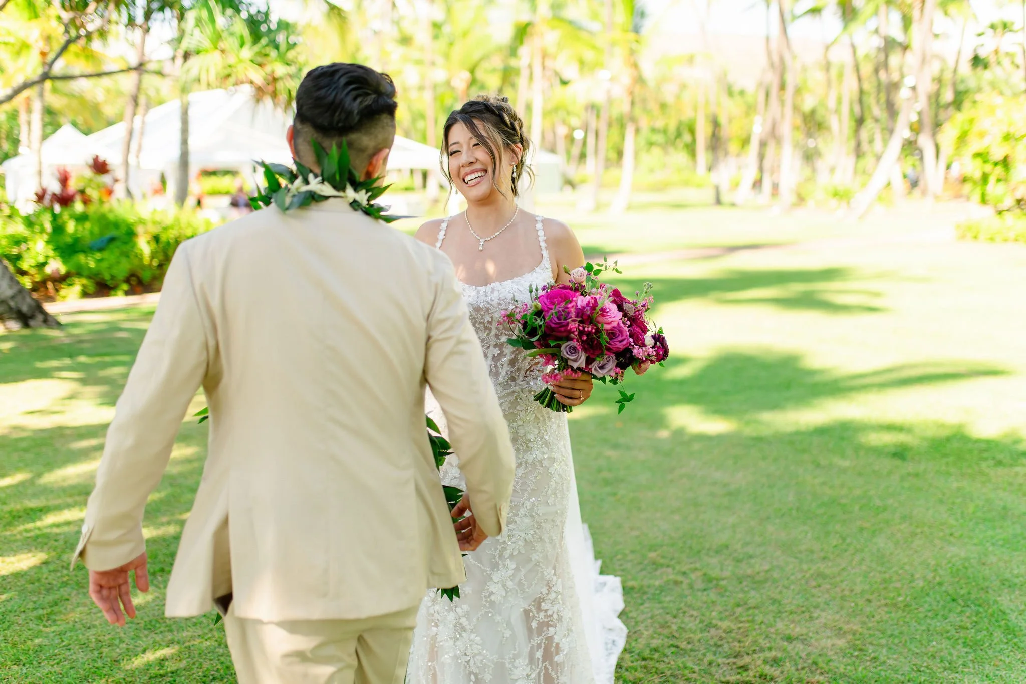 groom and bride during first look at wedding in hawaii