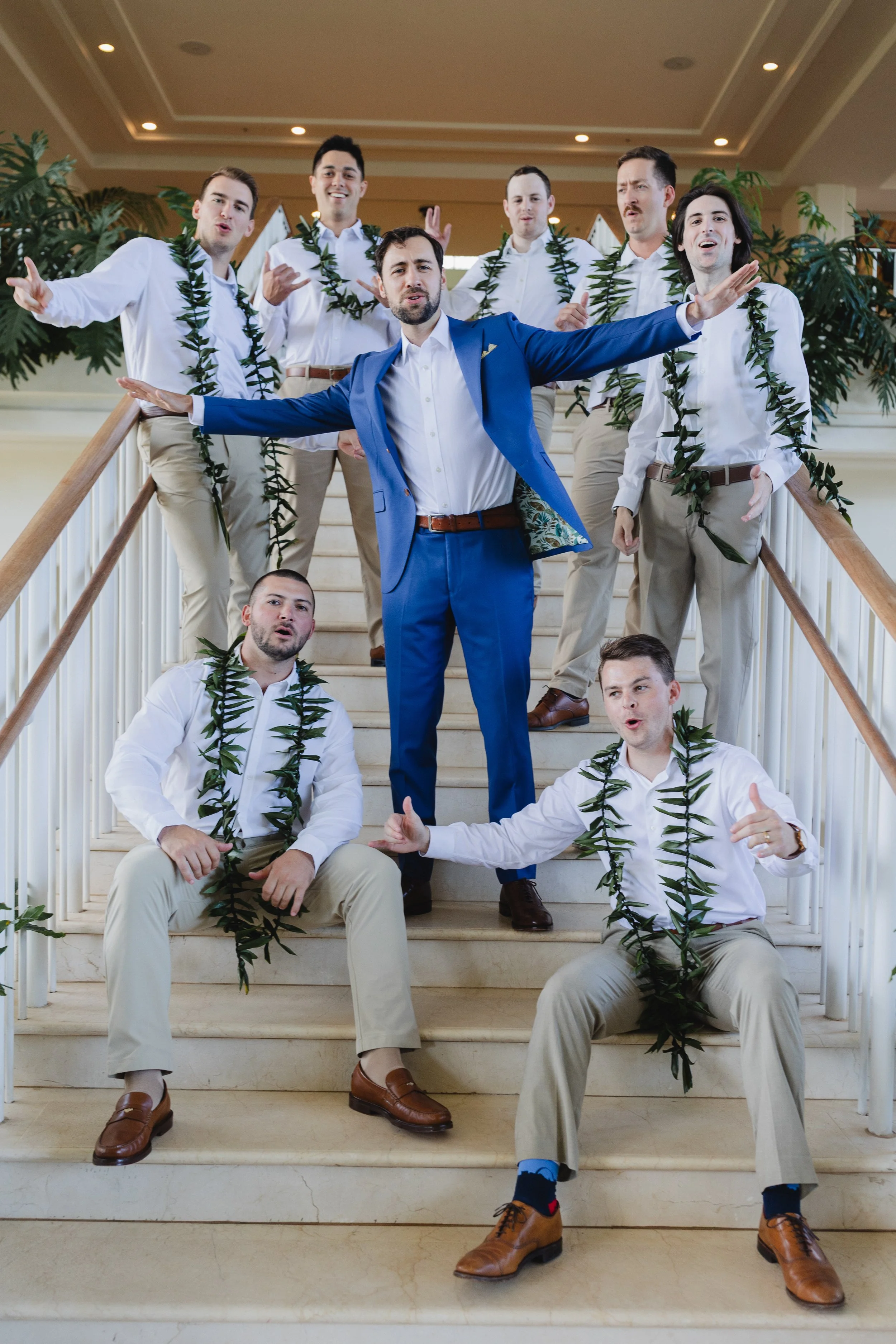 groom and groomsmen with lei