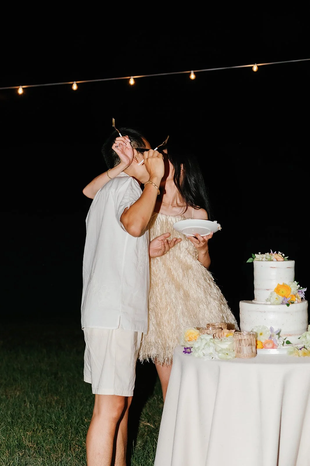 Bride and groom share a kiss