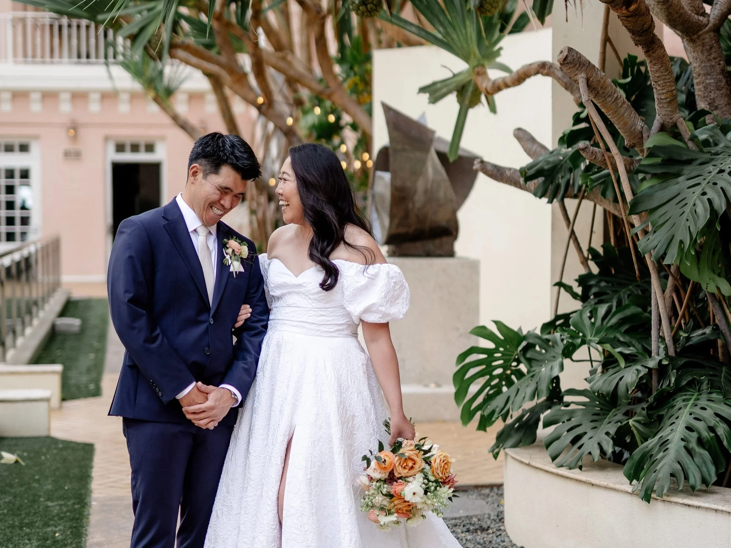 bride and groom looking at each other