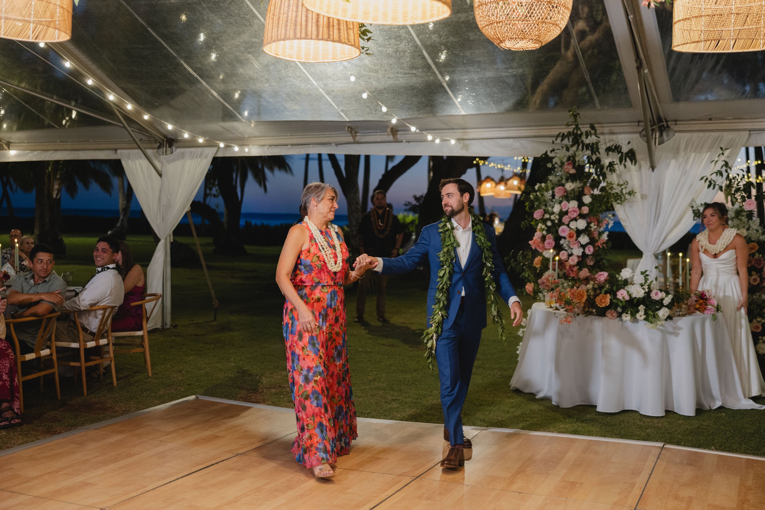 groom dancing with mother