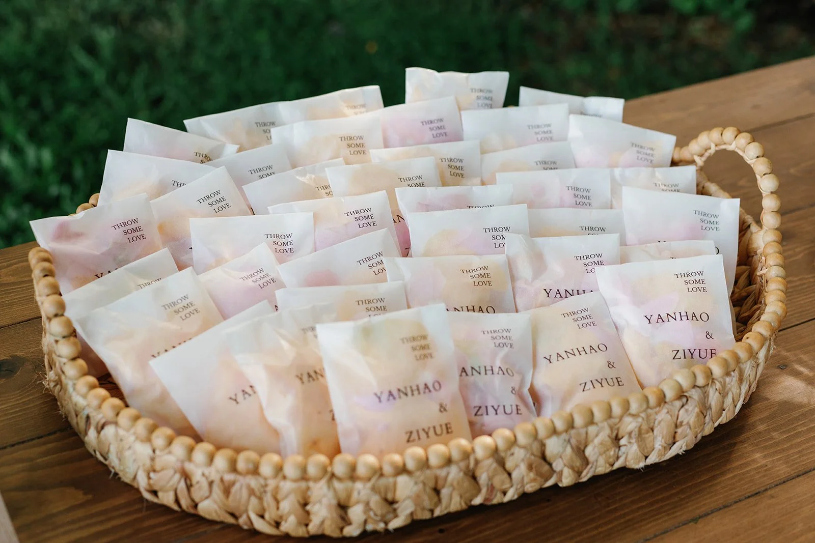 Toss petal bags in customized toss petal bags with couple names on them