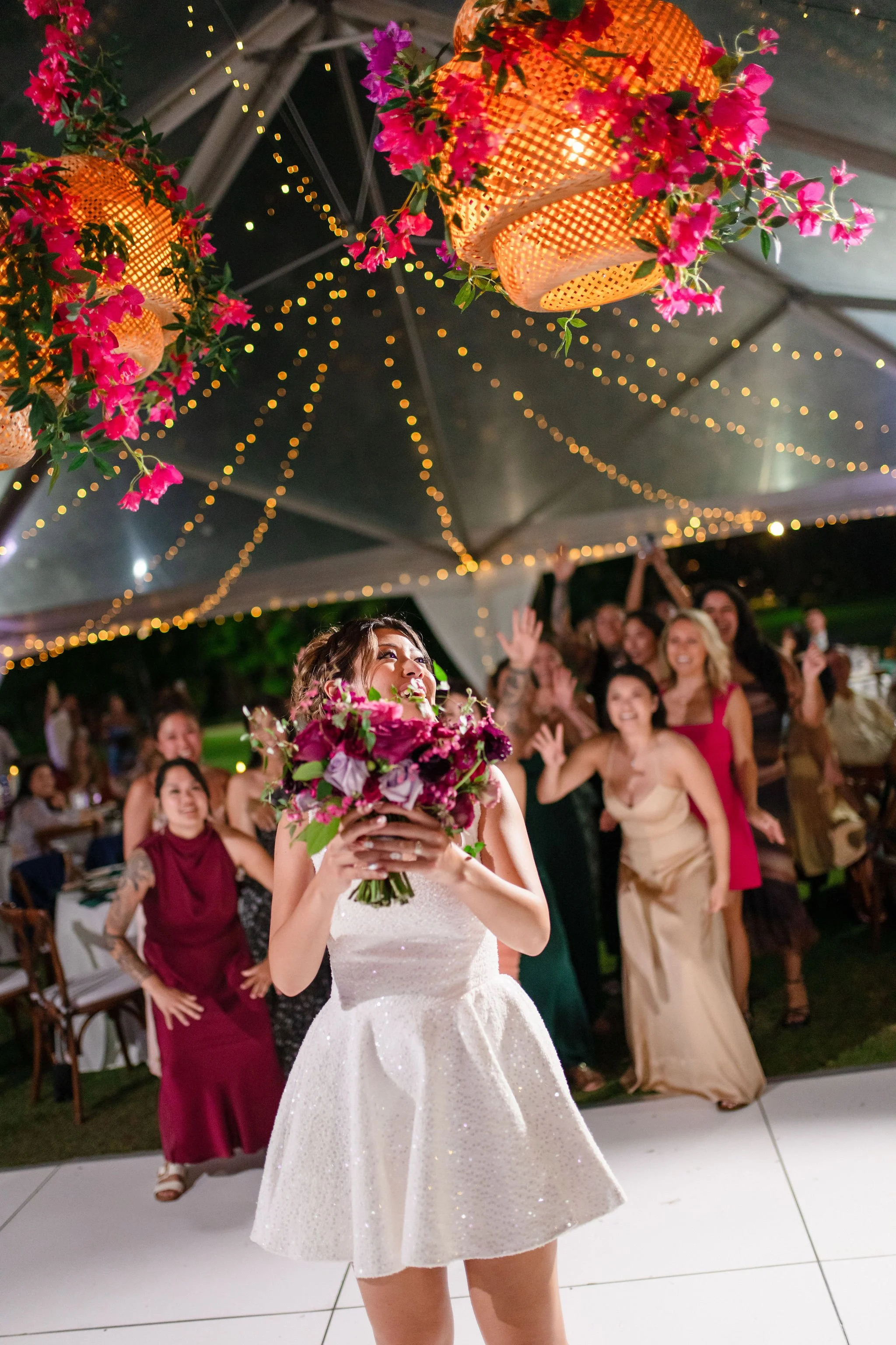 bride tossing bridal bouquet