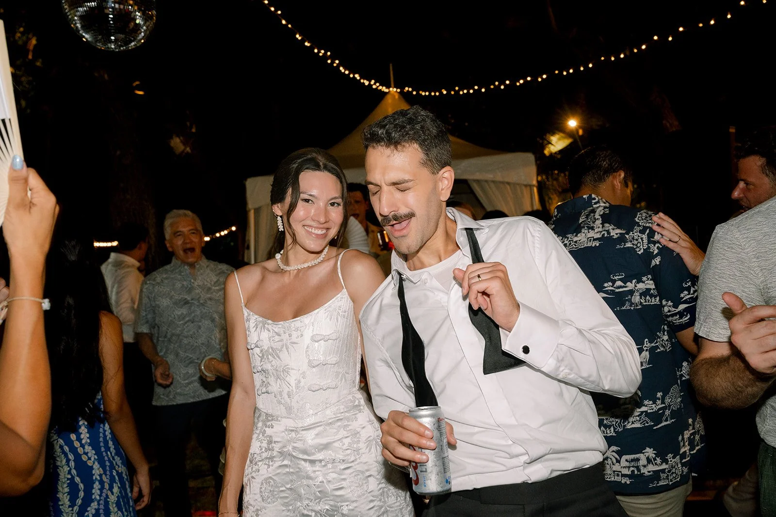 bride and groom at night