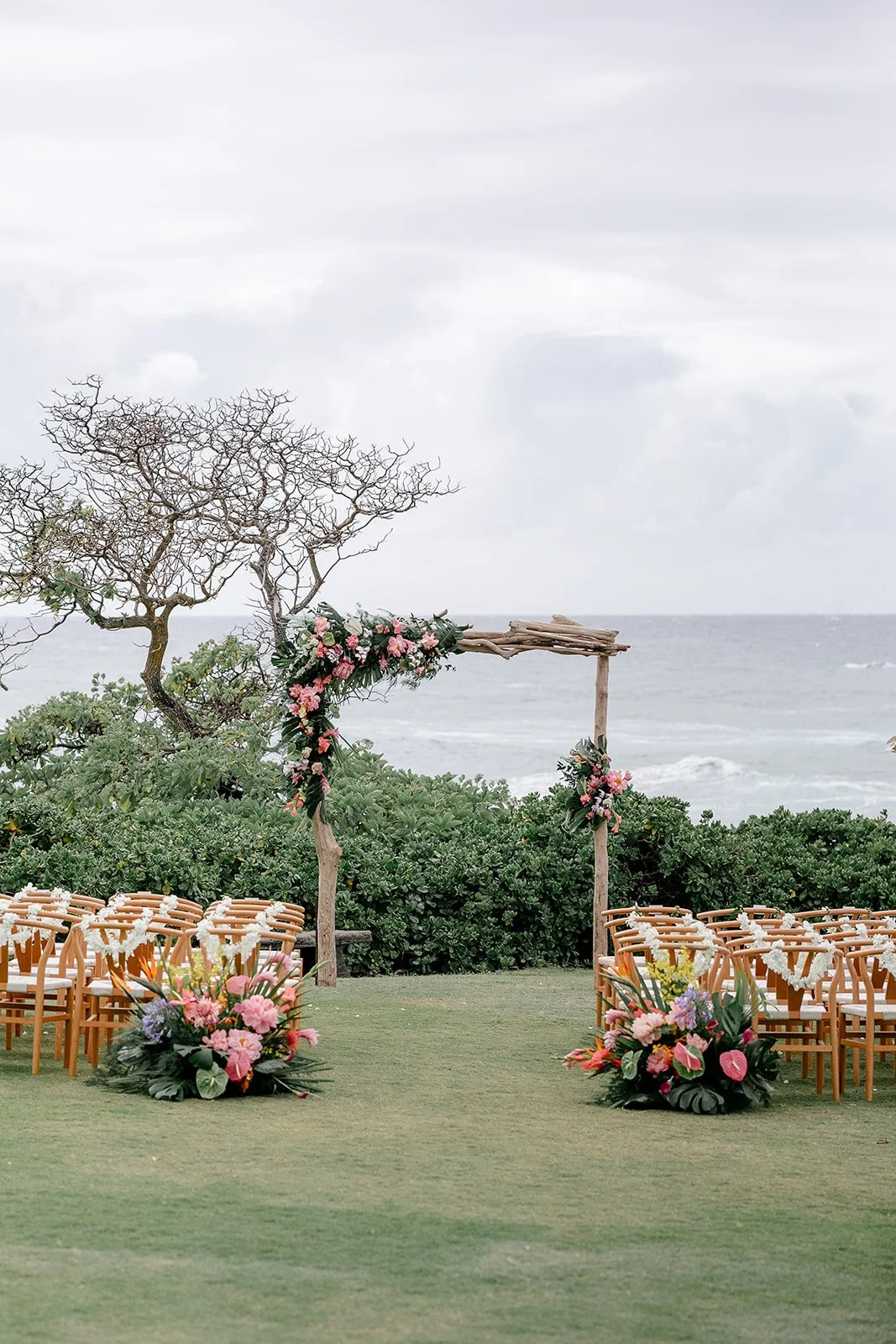 wedding ceremony altar and chairs in fornt of the ocean in hawaii