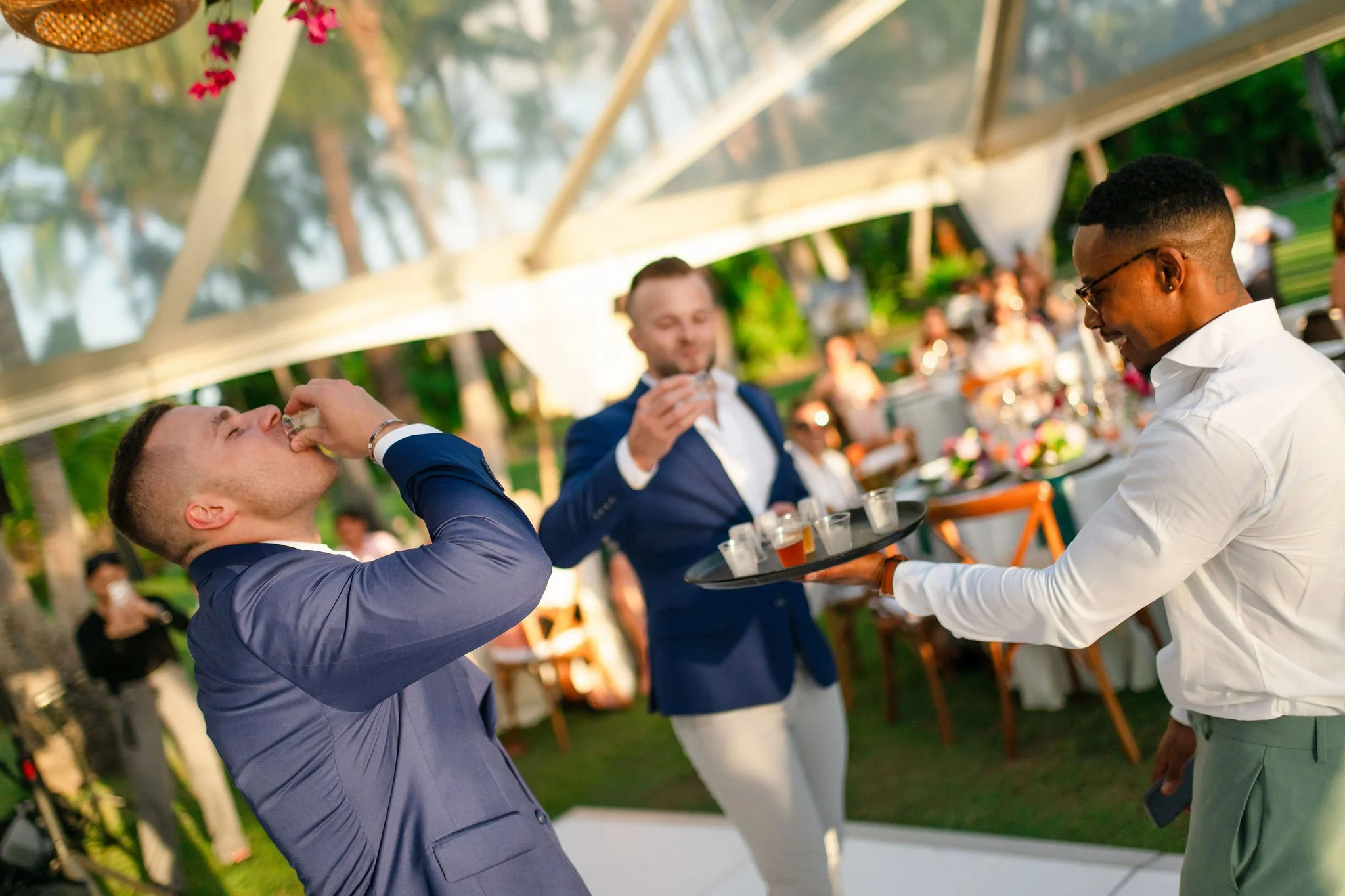 groomsmen taking shots