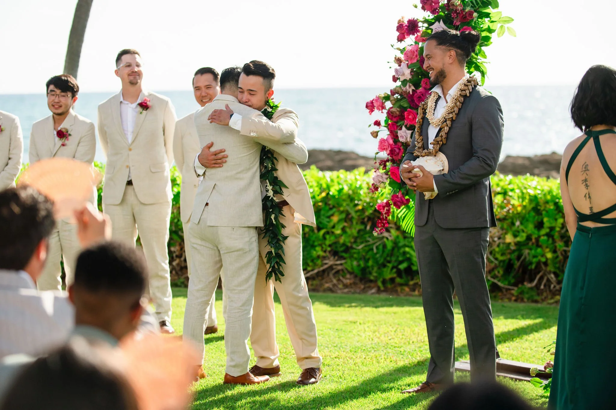 groom and groomsmen hugging