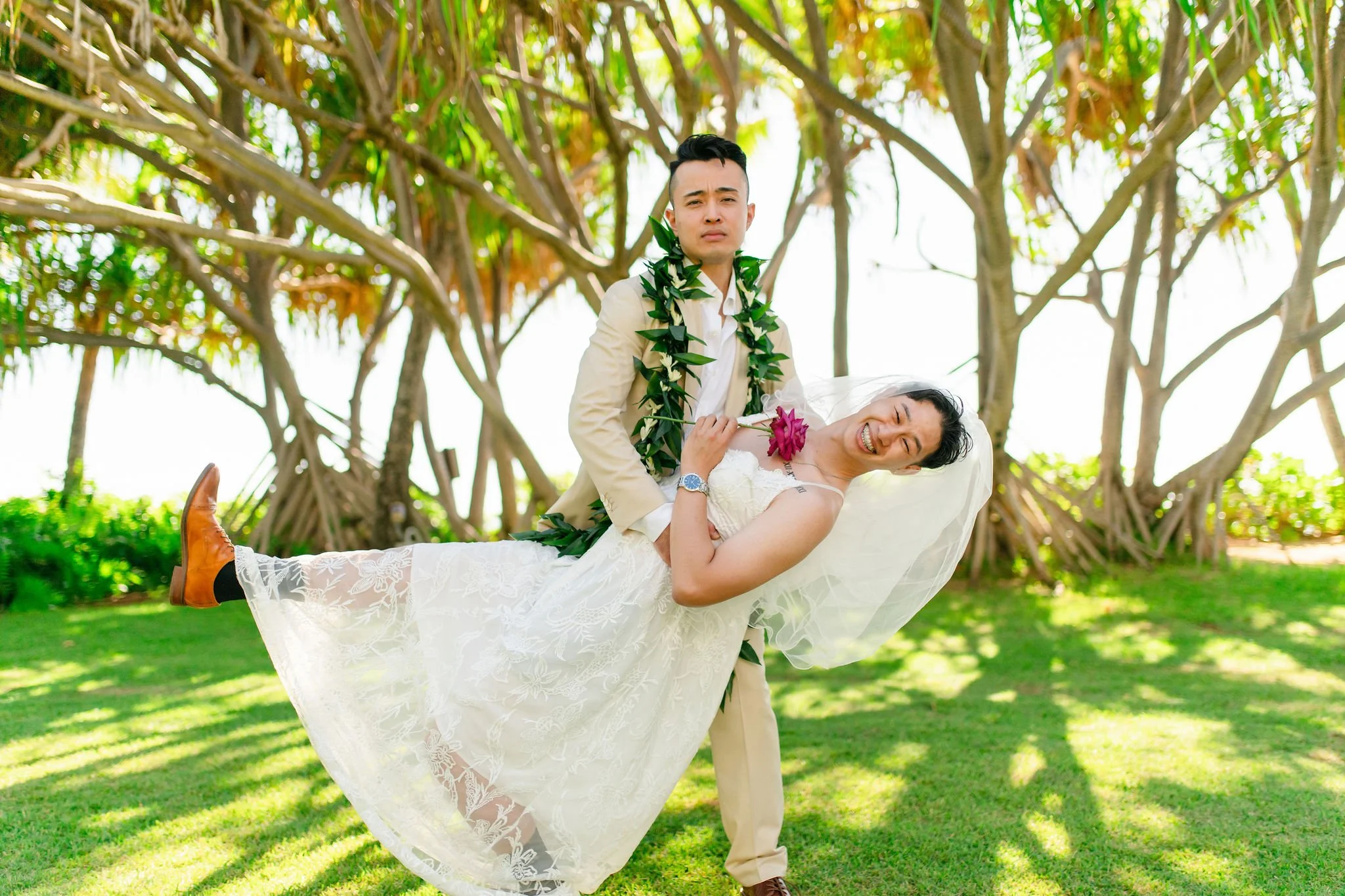 groomsman in wedding dress with groom