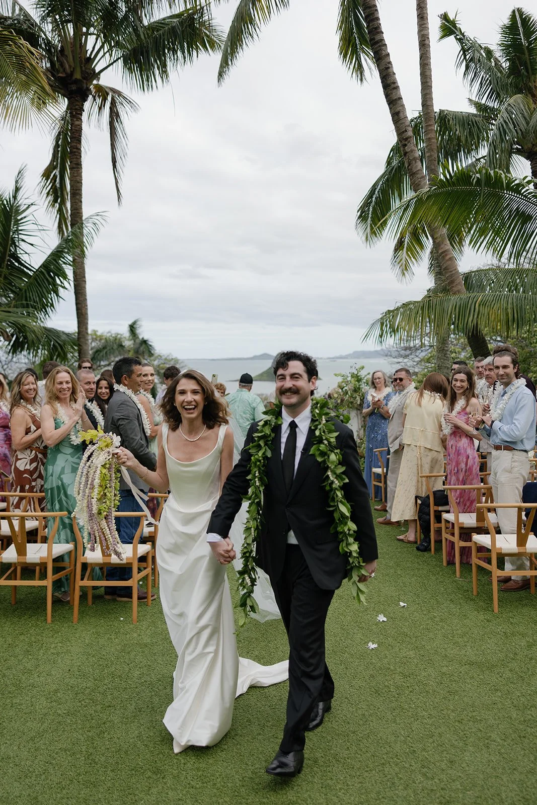 Bride and groom recessional at Paliku Gardens wedding, Oahu wedding planner Love Letter Weddings