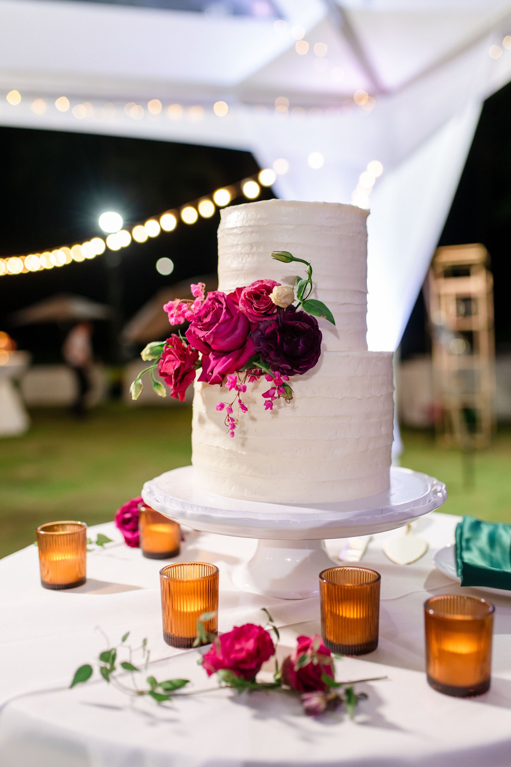 wedding cake with pink flowers