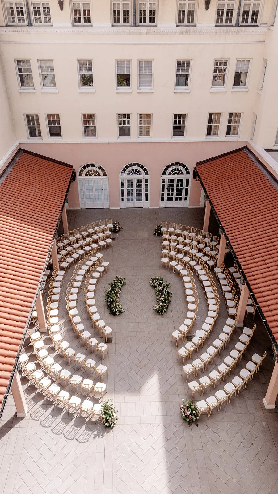 wedding ceremony at museum with circular chair set up