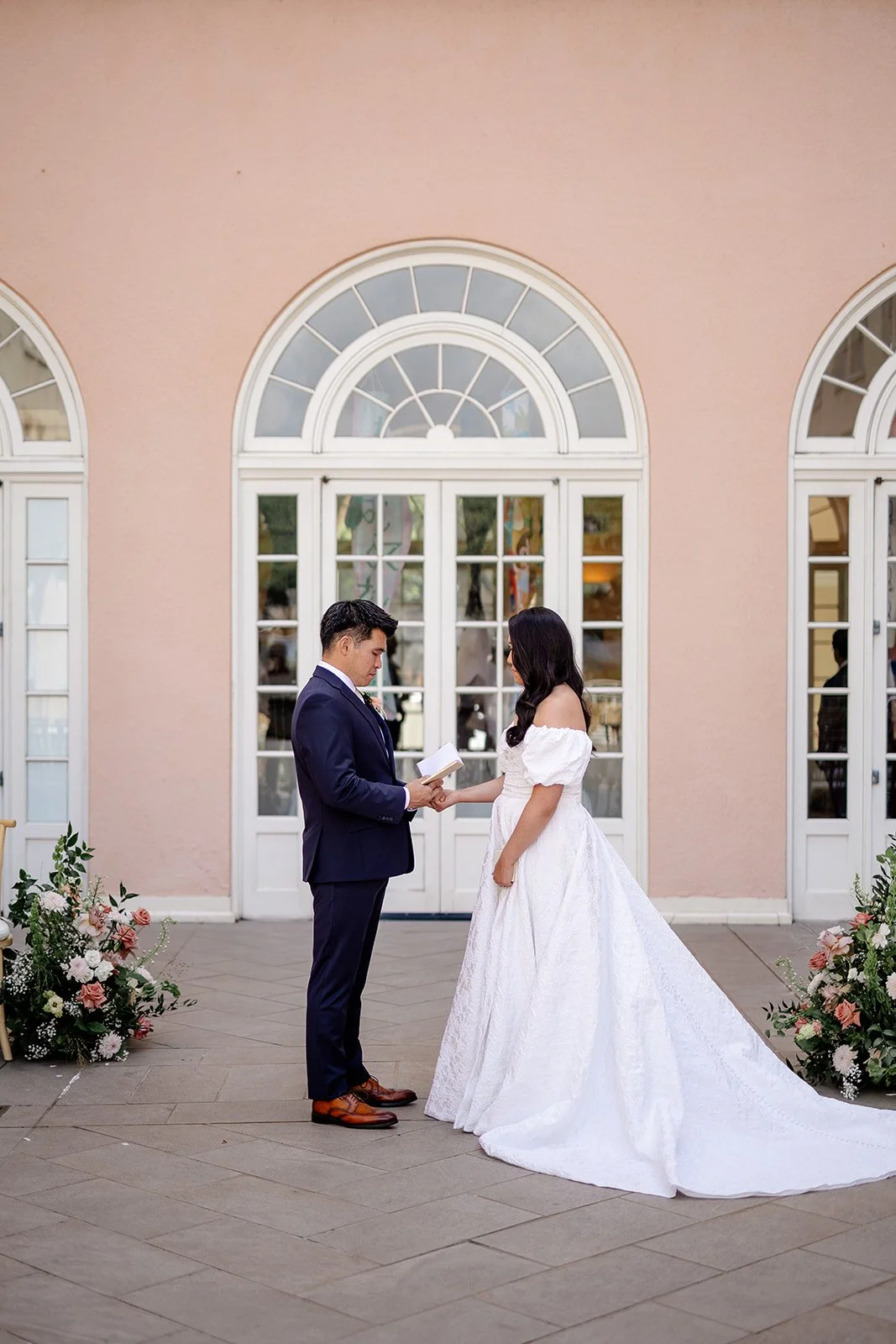 bride and groom first look at capitol modern museum in Hawaii