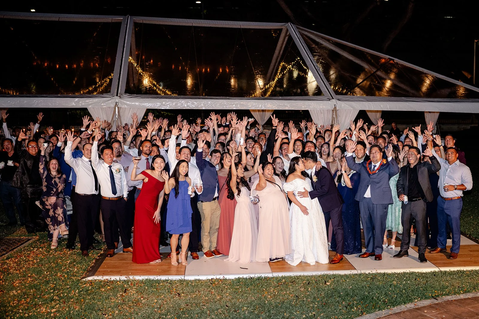 bride and groom with all their wedding guests