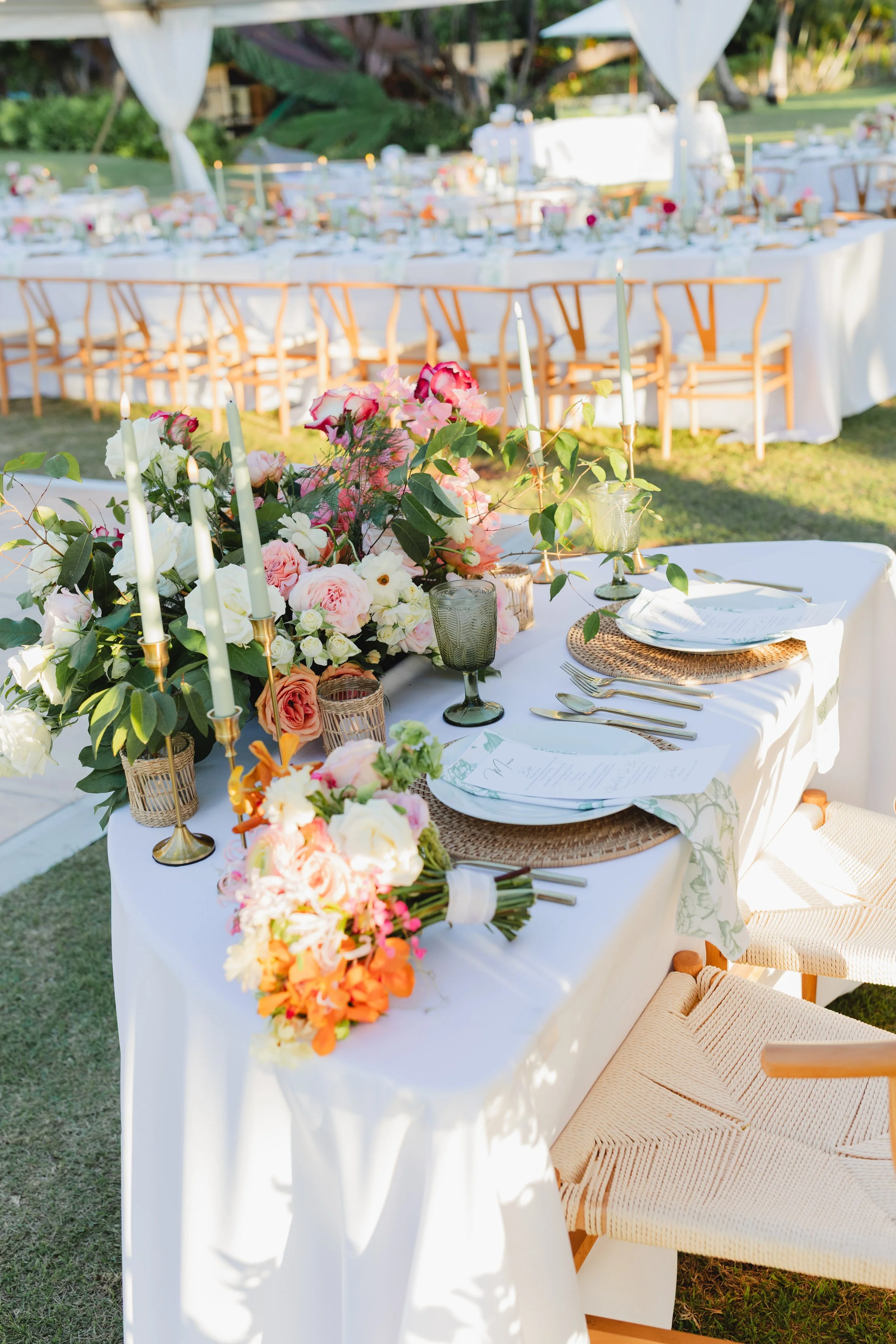 sweetheart table with pink and peach flowers