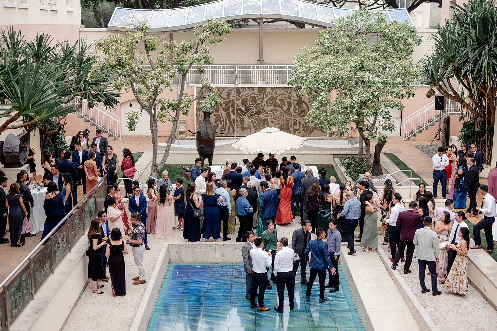 cocktail hour in sculpture garden at capitol modern museum in hawaii