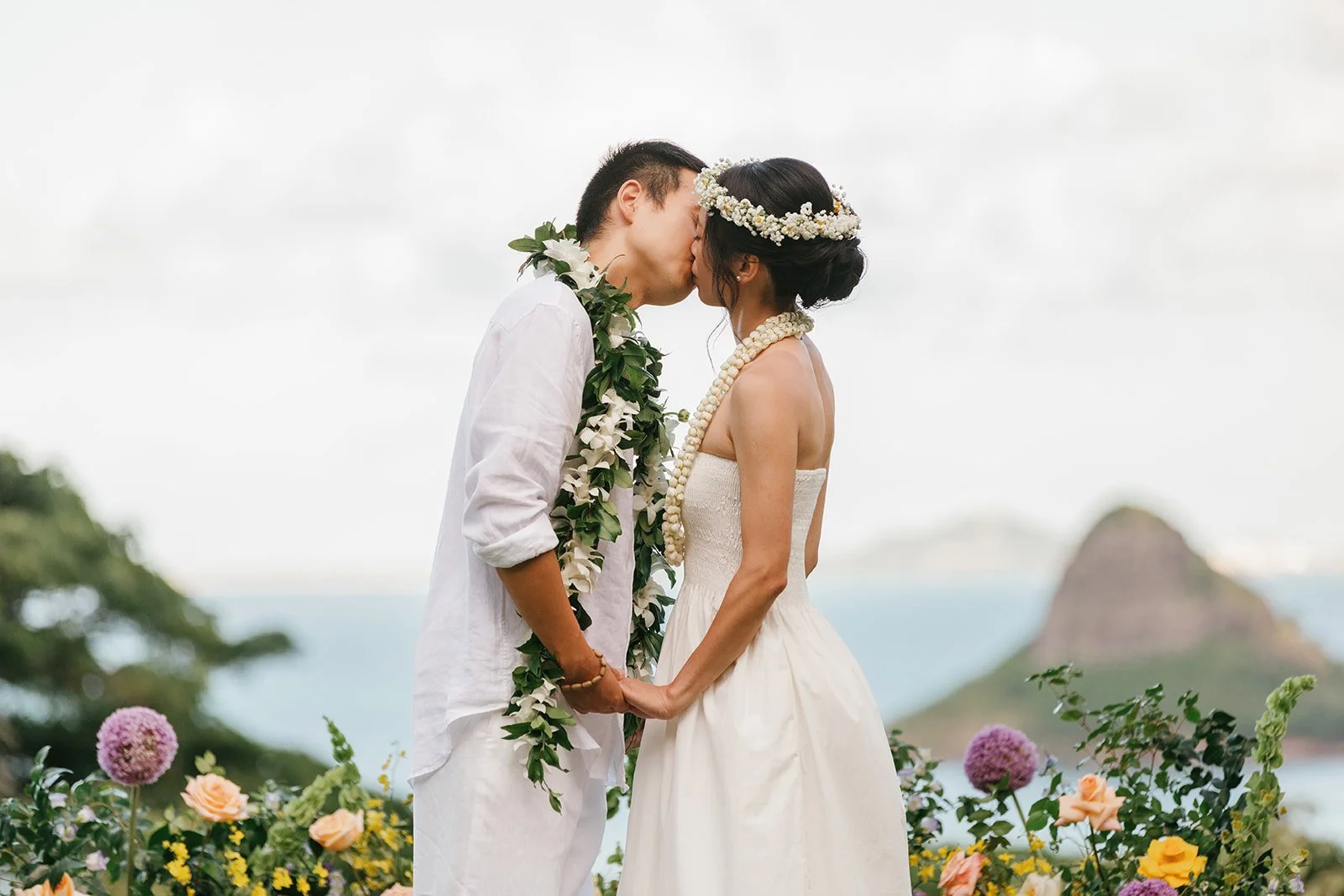 Bride and groom share first kiss