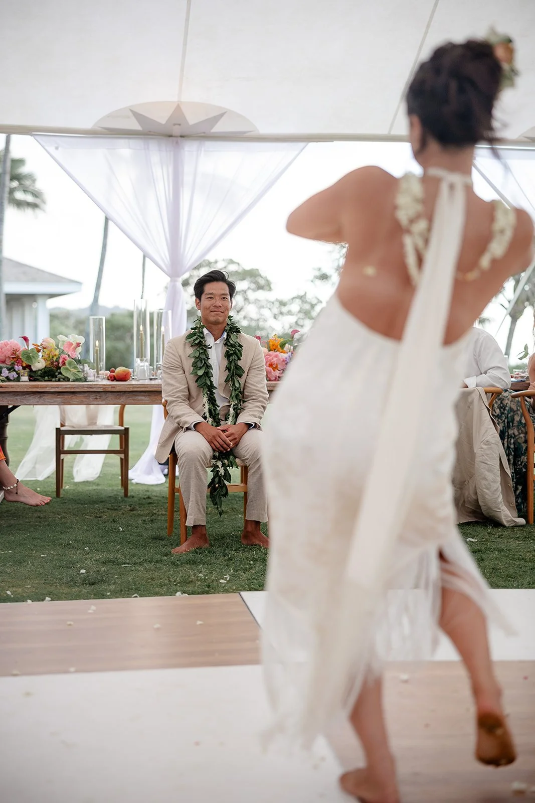 bride dancing hula for the groom