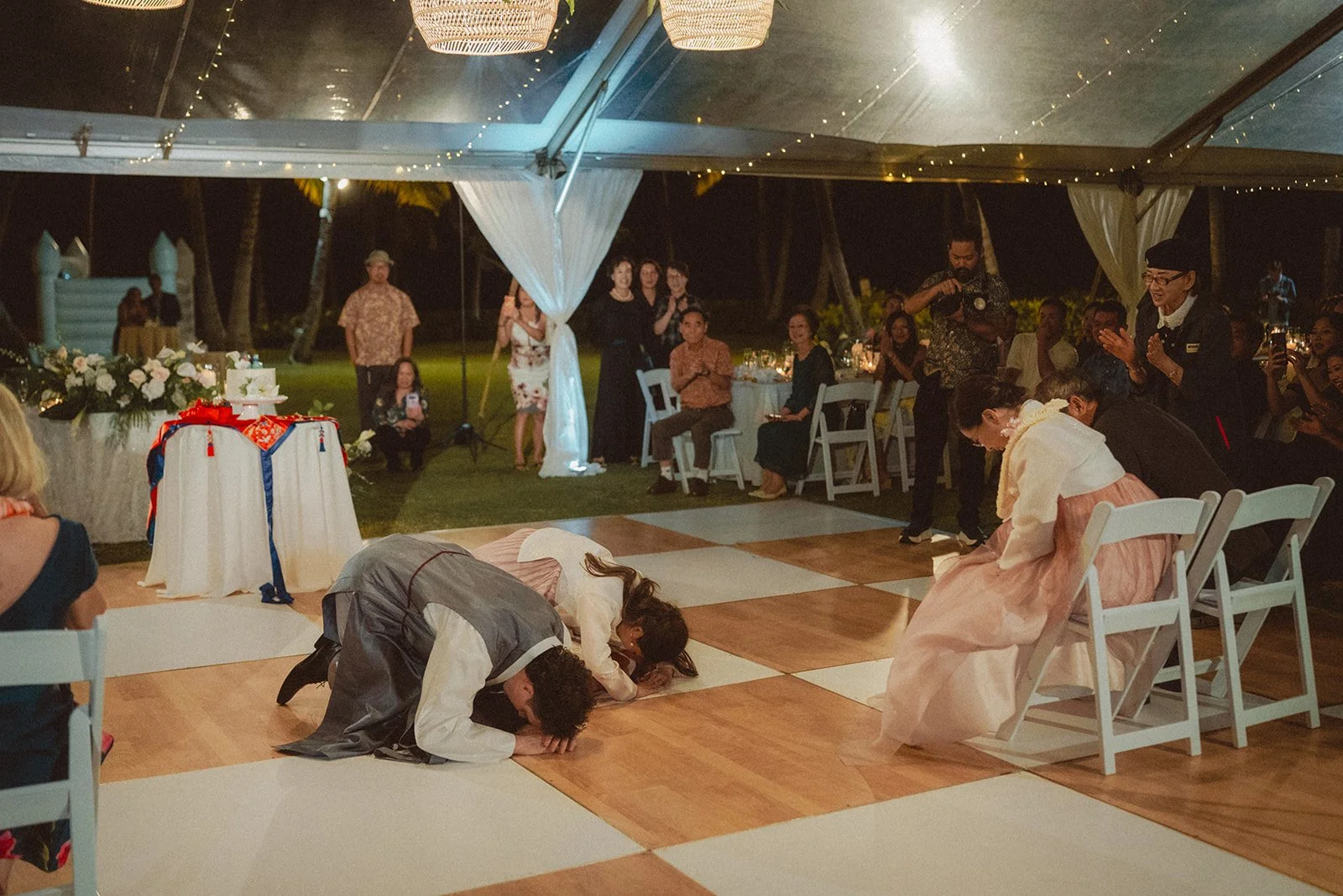 bride and groom doing traditional tea ceremony for parents