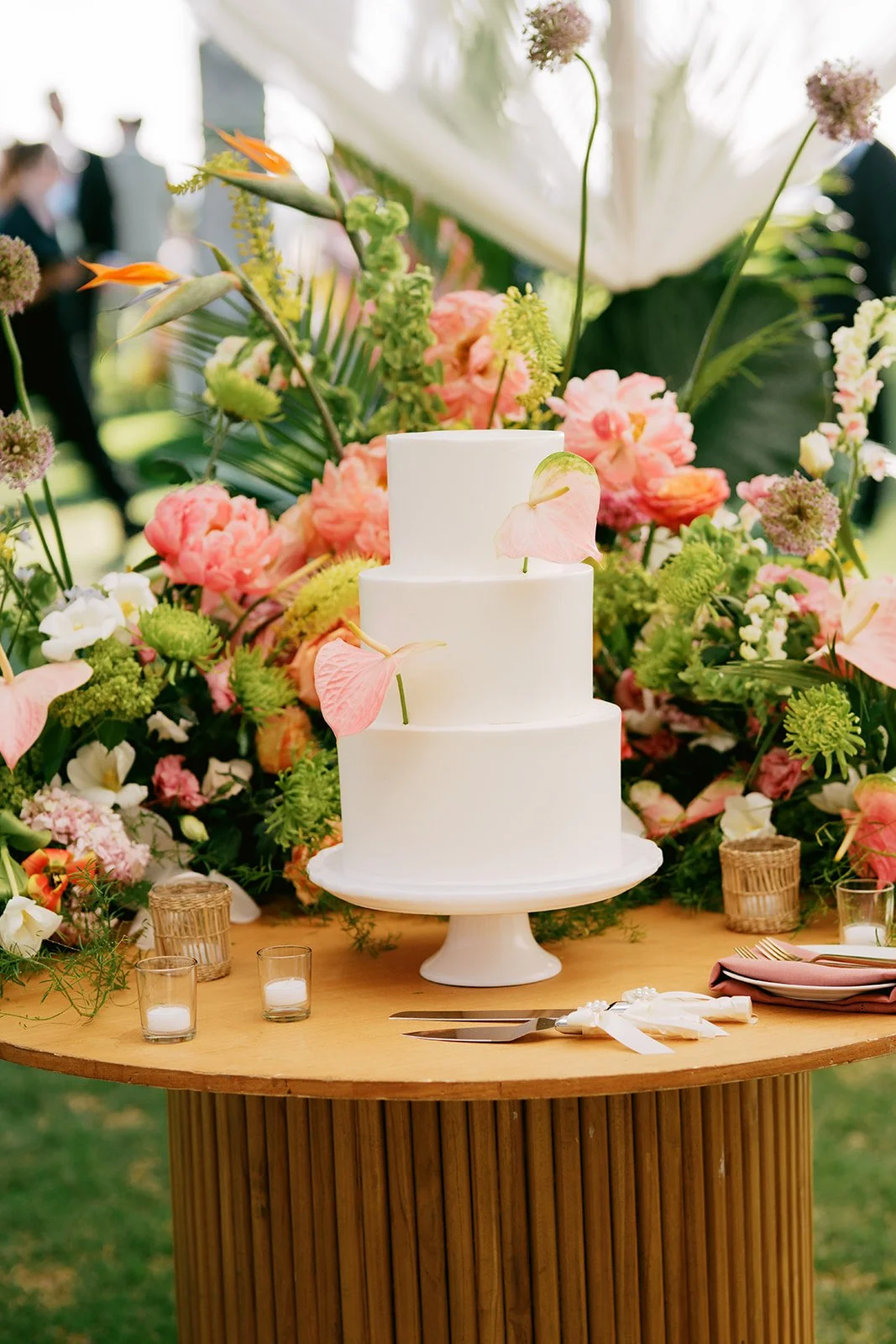 wedding cake with pink flowers