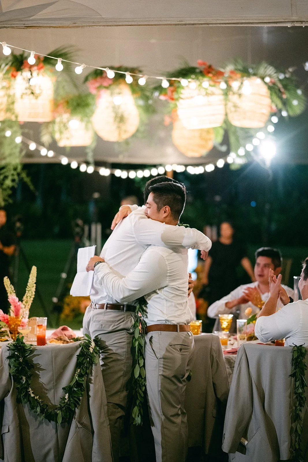 groom and groomsmen hugging