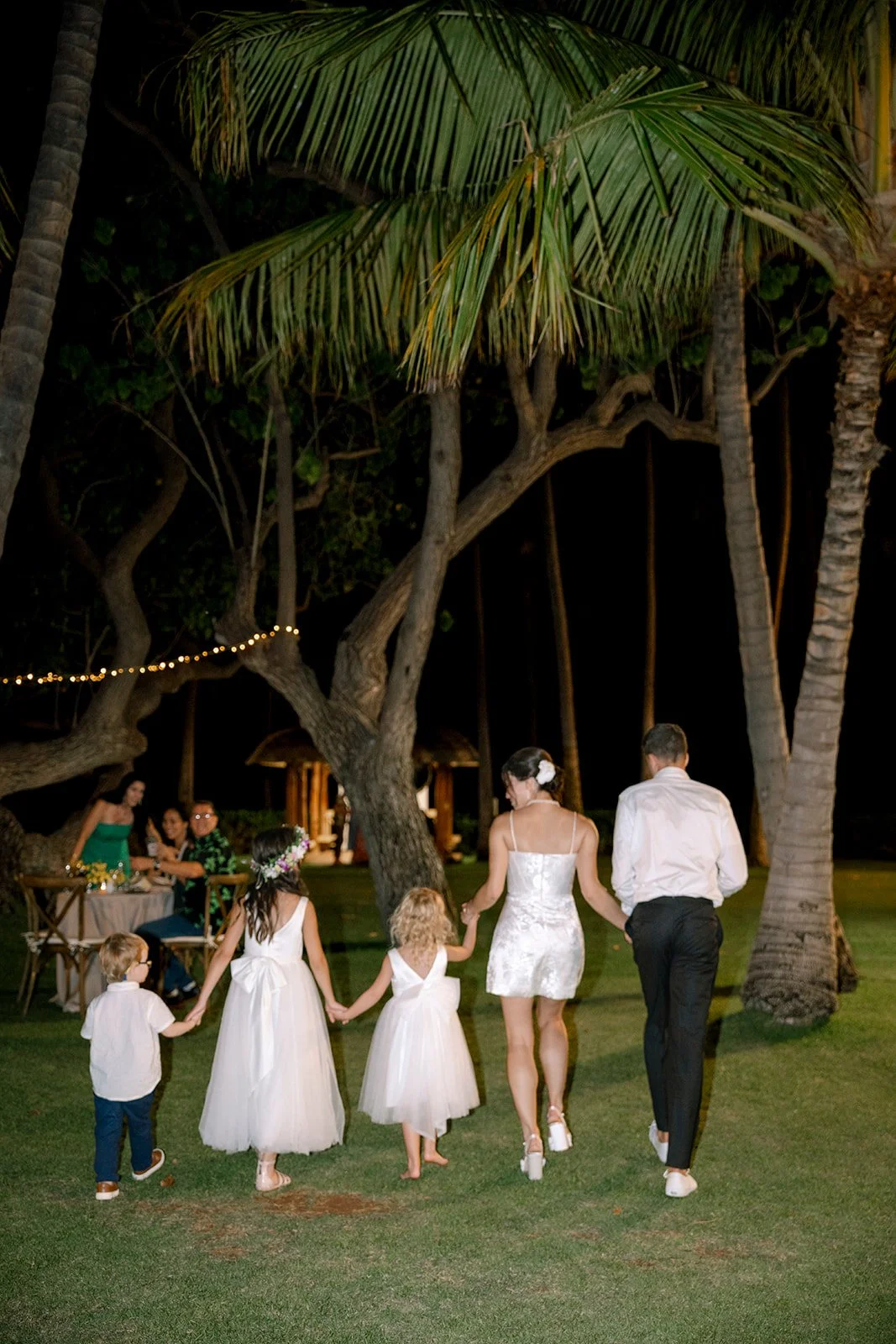 bride and groom with flower girls and ring bearer