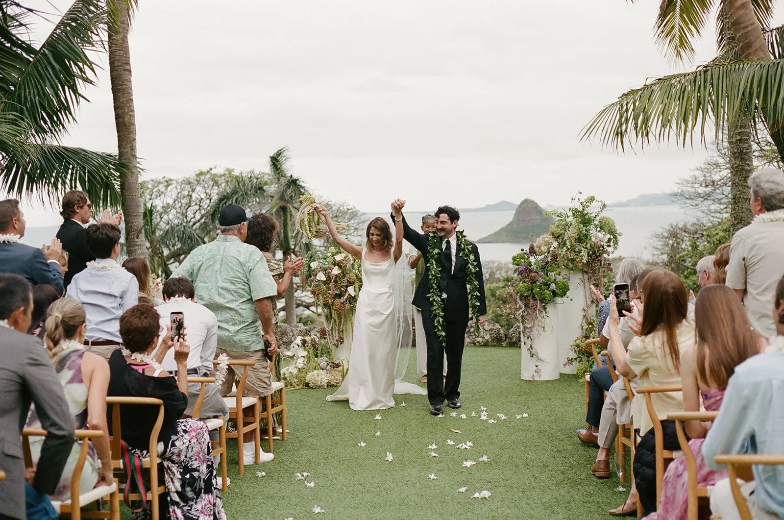 Bride and groom recessional at Paliku Gardens wedding, Oahu wedding planner Love Letter Weddings
